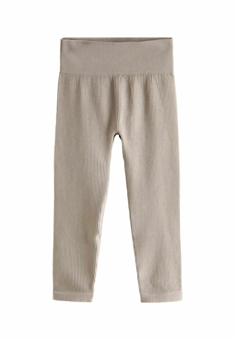 Leggings beige a coste con una ampia vita elastica e gambe aderenti. Realizzati in tessuto morbido, presentano un motivo a strisce continue e textured.