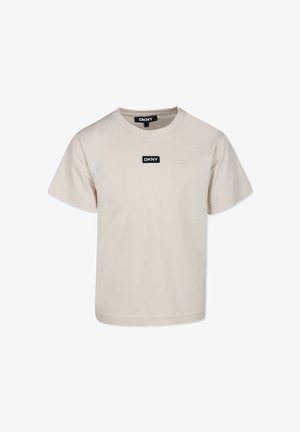 Lichtbeige katoenen T-shirt met korte mouwen, een ronde hals en een zwart DKNY logo patch op de voorkant.