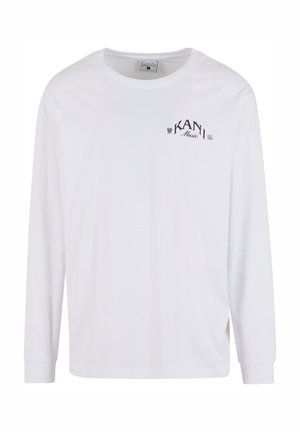 Witte langemmouwen t-shirt van katoen, met een ronde hals en een zwart geprint "KANI Music" logo op de linkerkant van de borst.