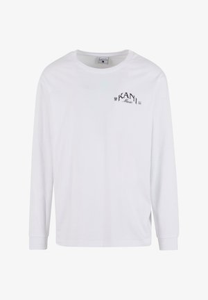 Witte langemmouwen t-shirt van katoen, met een ronde hals en een zwart geprint "KANI Music" logo op de linkerkant van de borst.