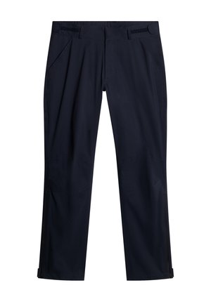 Marineblauwe waterdichte broek met een gladde textuur, voorzien van zijzakken, verstelbare taille-accenten en ritssluitingen bij de pijpen.
