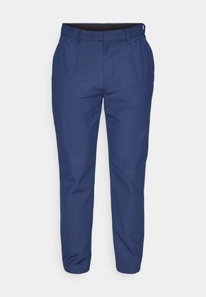 Pantalones azul marino con un diseño de pierna recta, confeccionados con tela suave, con pliegues y una cintura elástica para mayor comodidad.