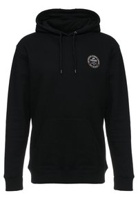 Felpa nera con cappuccio, tasca frontale, e un patch con logo rotondo sul petto. Realizzata in tessuto morbido con una superficie liscia.