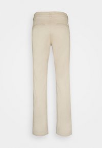 Pantaloni in cotone beige con design a gamba dritta, dotati di due tasche posteriori e dettagli di cucitura minimi. Tessuto morbido con una finitura liscia.