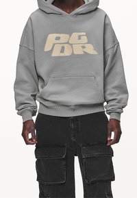 Pegador Jersey con capucha - grey