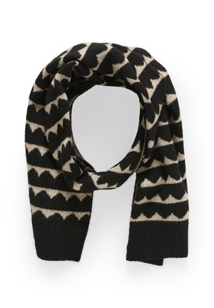 Black and beige knit scarf with zigzag and wave patterns, folded in a loop against a white background.