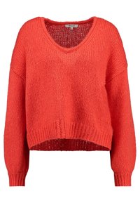 Maglione corto corallo luminoso con scollo a V, tessuto lavorato a maglia largo e spalle scese. Polsini e orlo a coste offrono dettagli aggiuntivi.