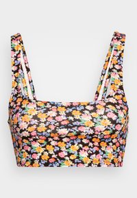 Bralette floral com fundo preto, apresentando flores multicoloridas vibrantes. Tem alças finas e um design cropped. Tecido macio e elástico.