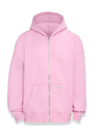 Light pink zip-up hoodie with a large hood, front pockets, and ribbed cuffs. Soft fabric with a smooth texture. Silver hardware detail on the zipper.
