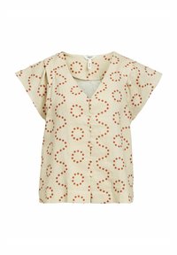 Blusa beige con mangas cortas, escote en V y botones en el delantero. Presenta un patrón de lunares rojos y líneas onduladas en toda la prenda. Tejido ligero.