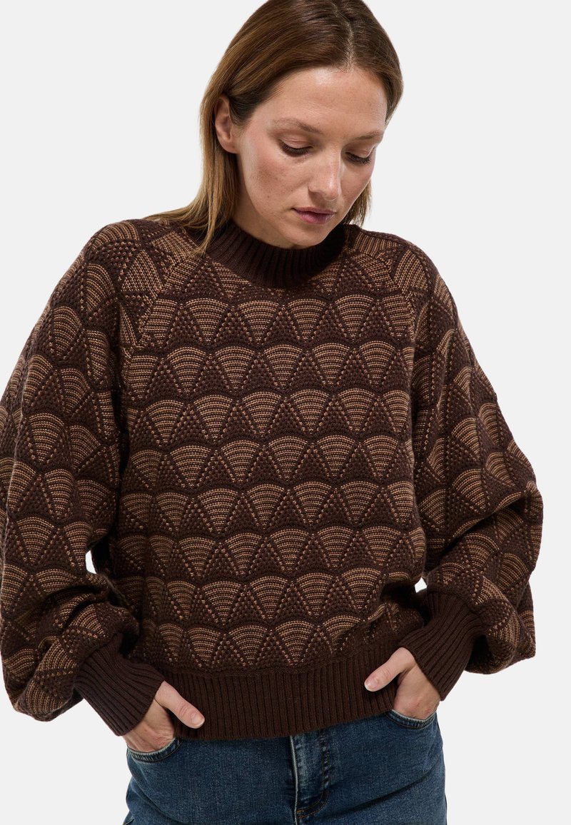 Pull en maille texturée avec design géométrique