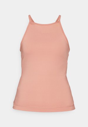 Perzikkleurige tanktop met een aansluitend ontwerp, dunne bandjes en naadloze randen, gemaakt van een gladde, rekbare stof.