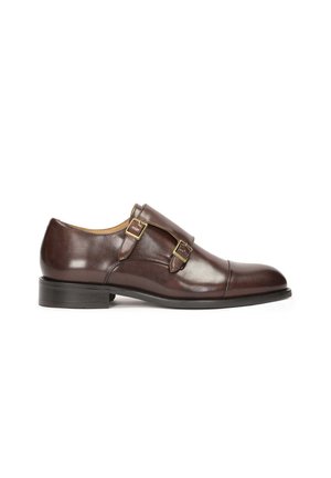 - Biznesowe loafersy
