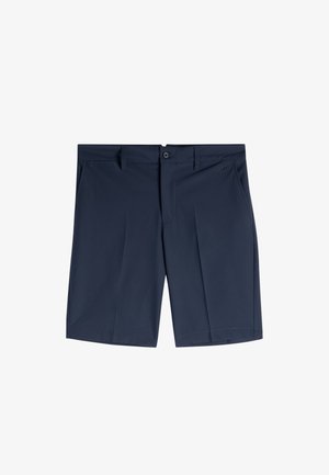 Marineblauwe, op maat gemaakte korte broek met riemlussen, zijzakken, knoopsluiting en een voorplooi op elk been.