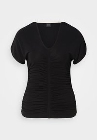 Black short-sleeve top with a V-neck and gathered texture along the front, made from stretchy fabric. Features a straight hem.