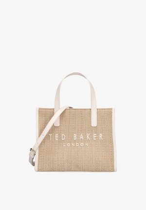 Beige woven tote bag with white handles and adjustable shoulder strap, featuring "TED BAKER LONDON" text on the front.