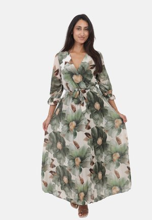 Robe maxi avec un décolleté en V profond, des manches longues et un motif floral comportant des feuilles vertes et des fleurs beiges, cintrée à la taille.