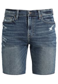 Džínové kraťasy v tmavě modré barvě s opotřebeným designem. Mají třepený lem, pět kapes a kovové zapínání. Texturovaná tkanina.