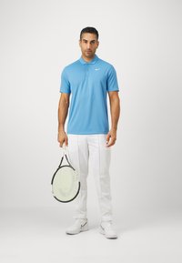Nike Performance SOLID - Poloshirts - blue beyond/white