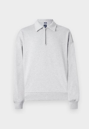 Gray sweatshirt with a half-zip collar, long sleeves, and ribbed cuffs and hem. Made from soft, textured fabric. Simple, unembellished design.