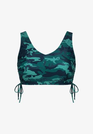 Zielony i ciemnoniebieski sportowy stanik z szerokimi ramiączkami i regulowanymi wiązaniami po bokach.