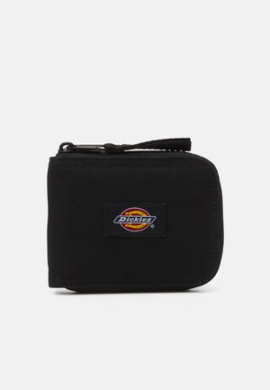 Black fabric wallet with a zip closure, featuring a prominent Dickies logo patch on the front. Compact square shape with a textured surface.