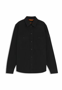 Mustapaita pitkillä hihoilla, valmistettu puuvillasta, jossa on nappikiinnitys edessä, kaksi rintataskua ja olkapään logopatch. Pehmeä rakenne.