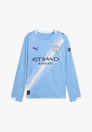 Světle modrý fotbalový dres s dlouhými rukávy, bílými diagonálními pruhy, logem Puma na hrudi, textem "ETIHAD AIRWAYS" a znakem Manchester City.