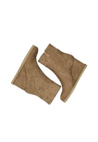 Tan suede wedge ankle boots with a smooth finish, side zipper, and textured rubber sole. Features a stitched design on the upper.