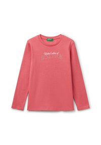 Long-sleeve, round-neck t-shirt in pink fabric with a soft texture. Features silver text "United colors of BENETTON" across the chest.