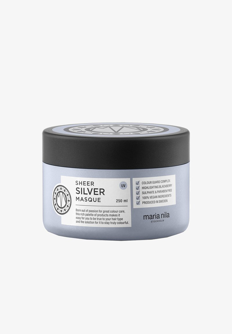 Round jar with a matte black lid and lavender body. Label features bold text, icons, and product details. Capacity: 250 ml.
