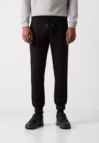 Antony Morato TROUSERS REGULAR FIT LOGOED METAL BADGE RUBBER PATCH - Tepláky - black
