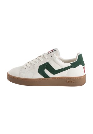 White leather sneaker with green suede accents, featuring a rubber sole, rounded toe, and prominent branding on the heel and tongue.