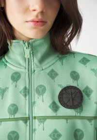 Carlo Colucci TRACKSUIT JACKET UNISEX - Cipzáras pulóver - light green