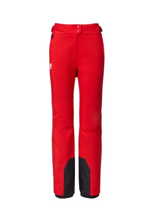 Red waterproof pants with black lower panels, adjustable waist, and reinforced seams, suitable for outdoor activities in wet conditions.