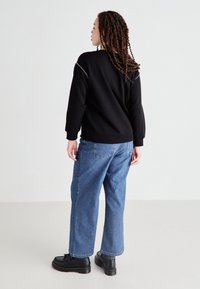 Vero Moda Curve VMCDAISY  - Ikdienas džemperis - black