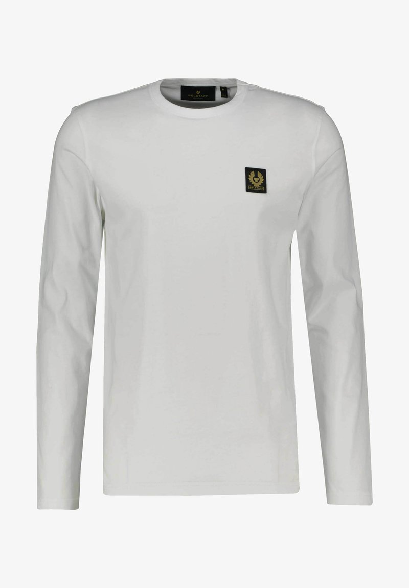 Hosszú ujjú fehér póló, pamutból készült, kerek nyakkivágással és egy kis fekete-arany logópóttal a bal mellen.