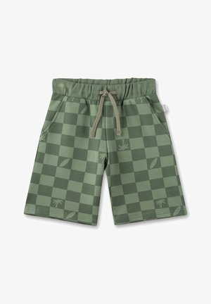 Pantalones cortos verdes a cuadros con cintura elástica, cordón, bolsillos laterales y sutiles patrones de hojas tropicales y palmeras.