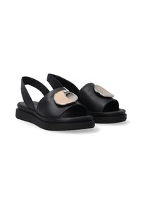Schwarze Ledersandalen mit offener Zehe, Slingback-Design, das ein auffälliges metallisches Akzent auf dem Obermaterial und eine flache Sohle aufweist.