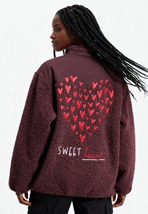 Veste polaire - bordeaux