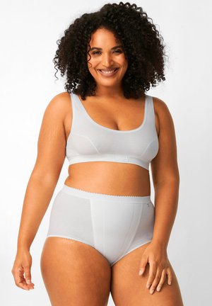 Reggiseno lounge grigio chiaro e mutande alte in tessuto morbido con bordi ondulati. Design semplice, costruzione senza cuciture.