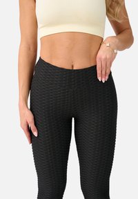 Megaman PUSH-UP - Leggings - Trousers - schwarz