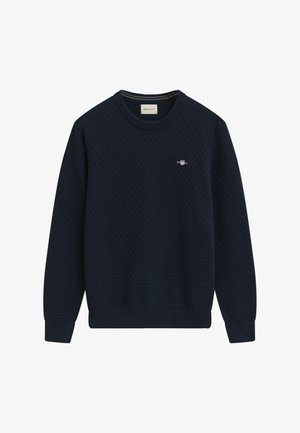 Navyblauwe sweater van textiel, met een geribde ronde hals en boorden. Kleine geborduurde logo op de borst.