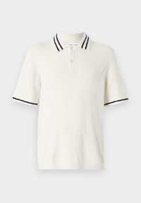 Poloko s krátkym rukávom v off-white textilnej tkanine, s pleteným golierom s dvoma čiernymi pruhmi a s troj gombíkovou légou.