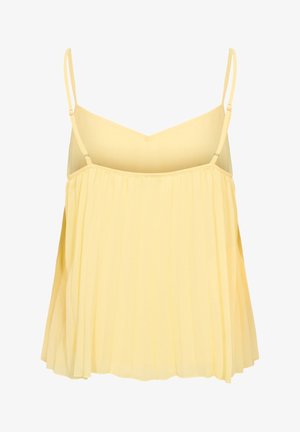 Kollane varrukateta volditud top õhukeste reguleeritavate õlapaelte ja südamekujulise dekolteega.