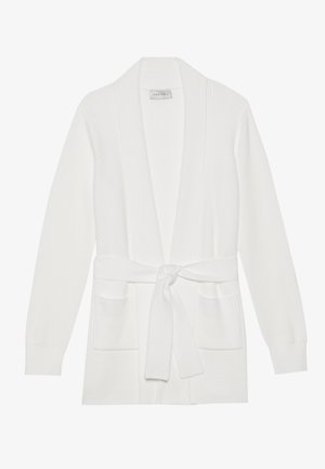 Cardigan blanc à côtes avec col châle, manches longues et ceinture à nouer. Dispose de deux poches avant et d'une texture douce.