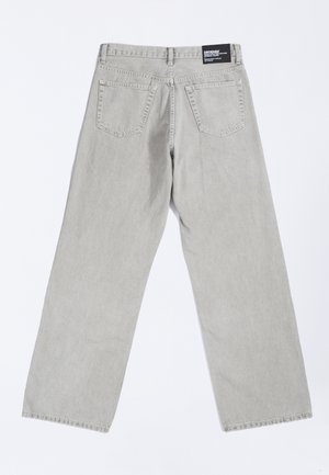 Jeans a gamba larga grigio chiaro con vestibilità comoda, caratterizzati da due tasche posteriori e dettagli con orlo scucito. Etichetta sulla vita per l'identificazione del marchio.