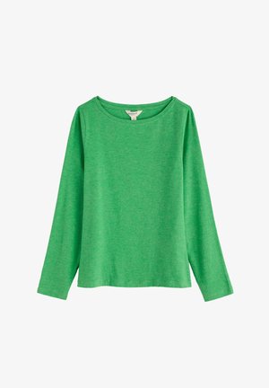 Zaļš krekls ar garām piedurknēm un taisnu apakšmali, izklāts uz balta fona.