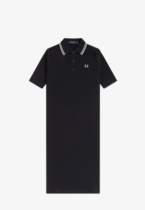 Robe polo noire à manches courtes en tissu côtelé, avec double rayures blanches sur le col et petit logo couronne de laurier blanche sur la poitrine.