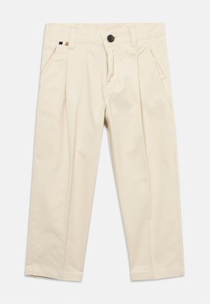 Beige straight-leg trousers with pleats, side pockets, belt loops, and a black button closure at the waist.
